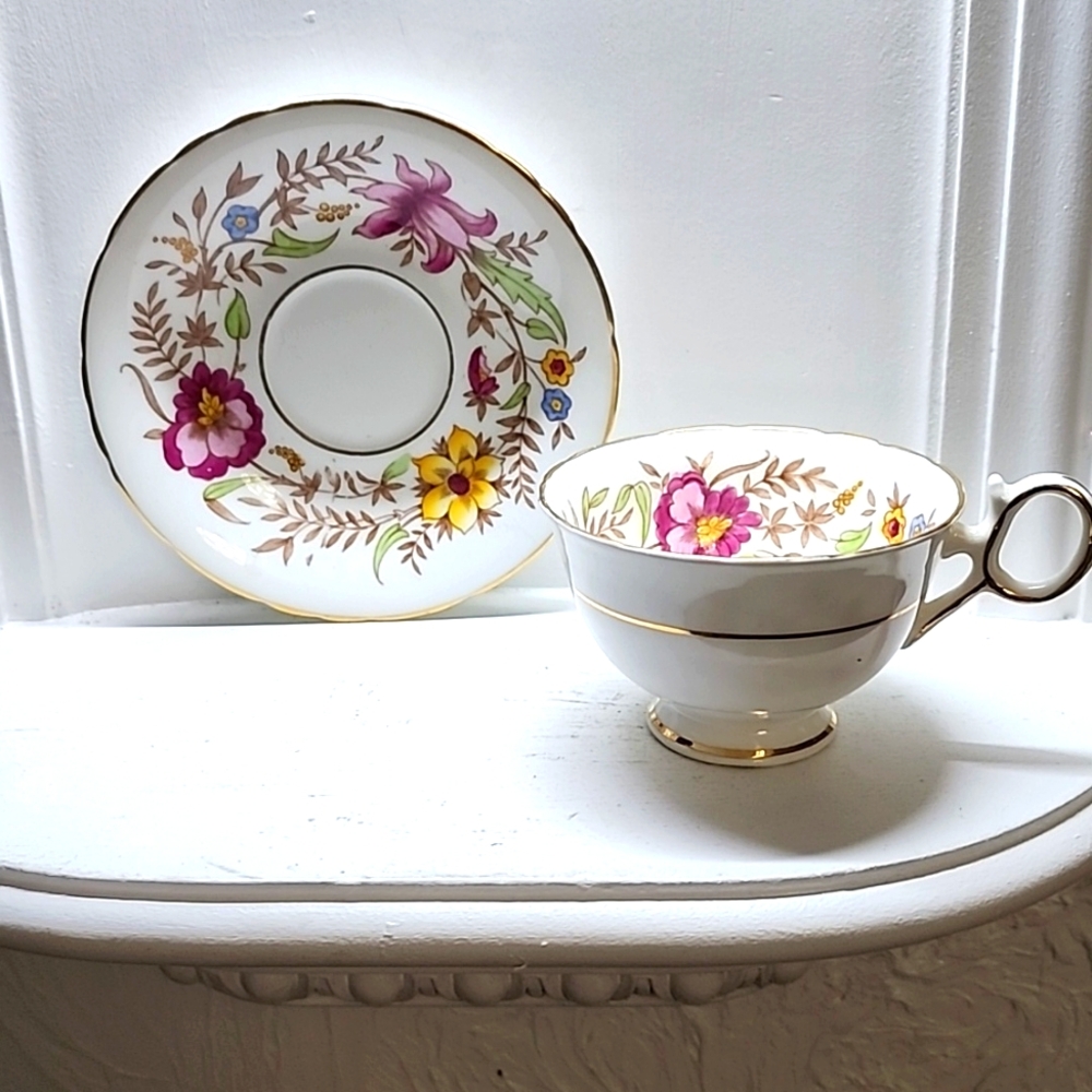 Delphine Bone China Made in England, Tea cup and Saucer, flowers gold rim